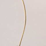 Serpentine Arc Gold Bar Necklace